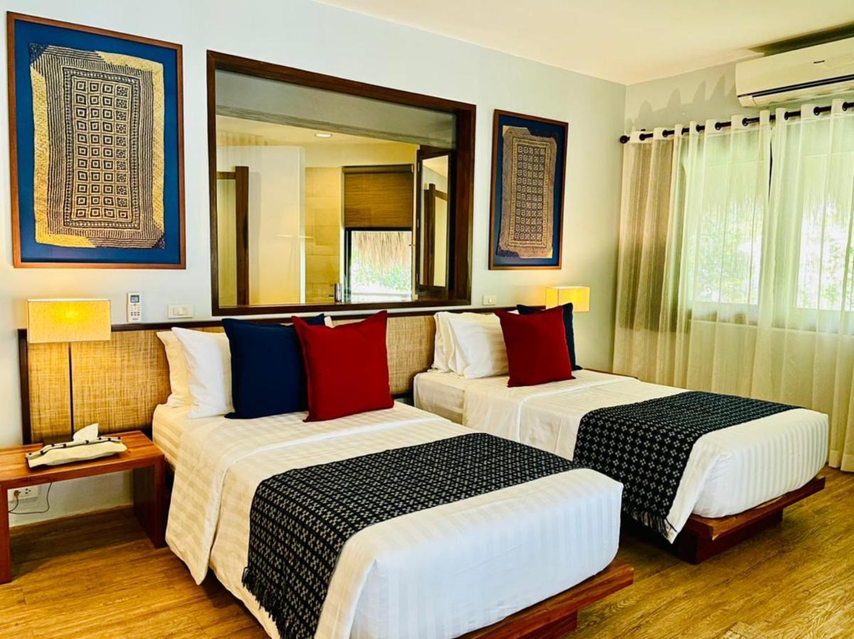 Amun Ini Beach Resort & Spa Анда Экстерьер фото