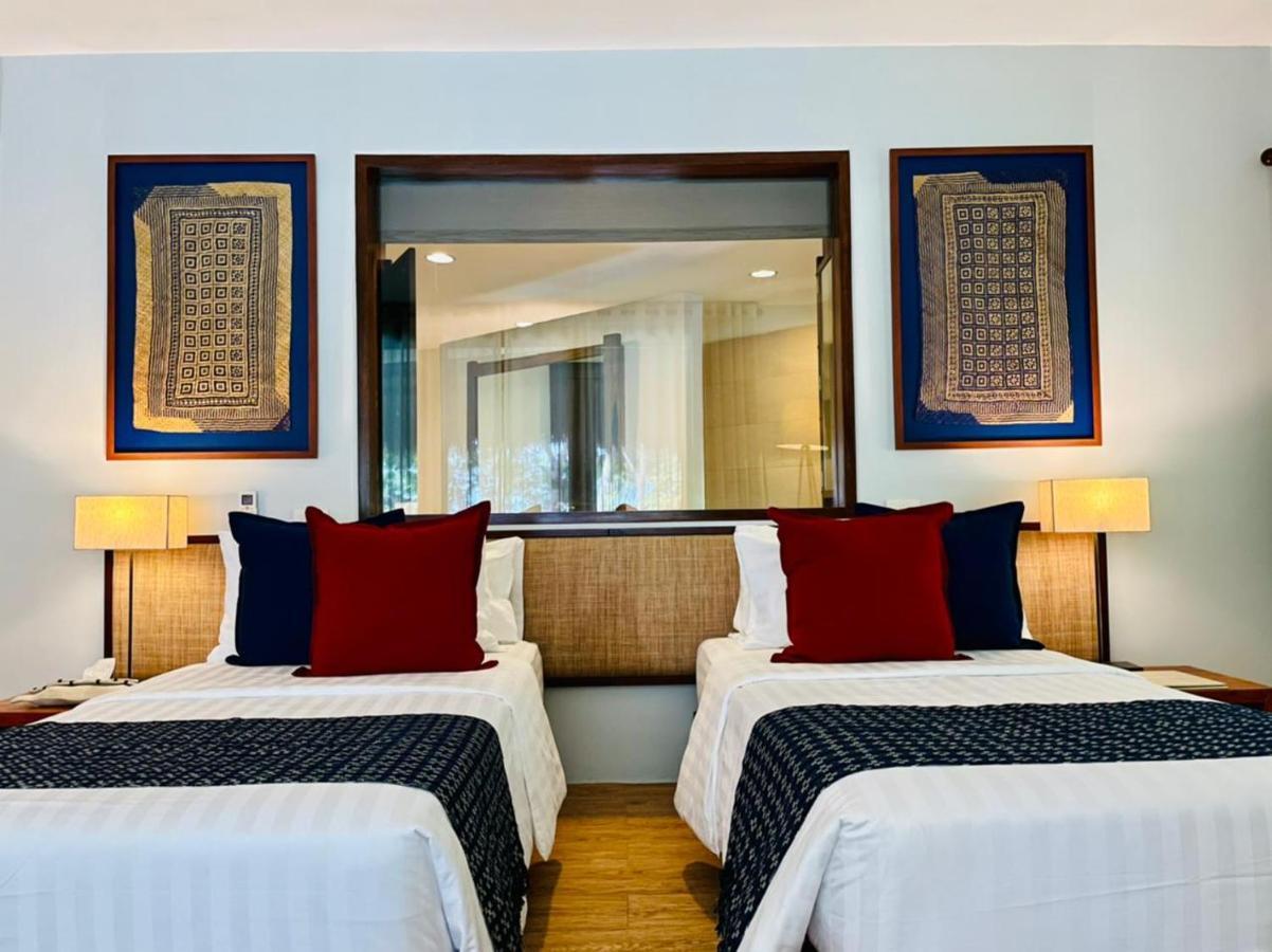 Amun Ini Beach Resort & Spa Анда Экстерьер фото
