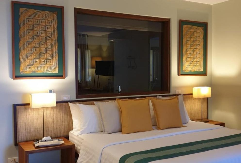 Amun Ini Beach Resort & Spa Анда Экстерьер фото